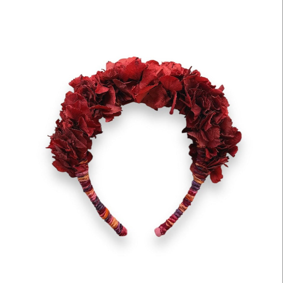 Handcrafted Burgundy Hydrangea Headpiece with real preserved hydrangeas in deep burgundy and dark red tones, finished with colourful hand-wrapped yarn detailing.
