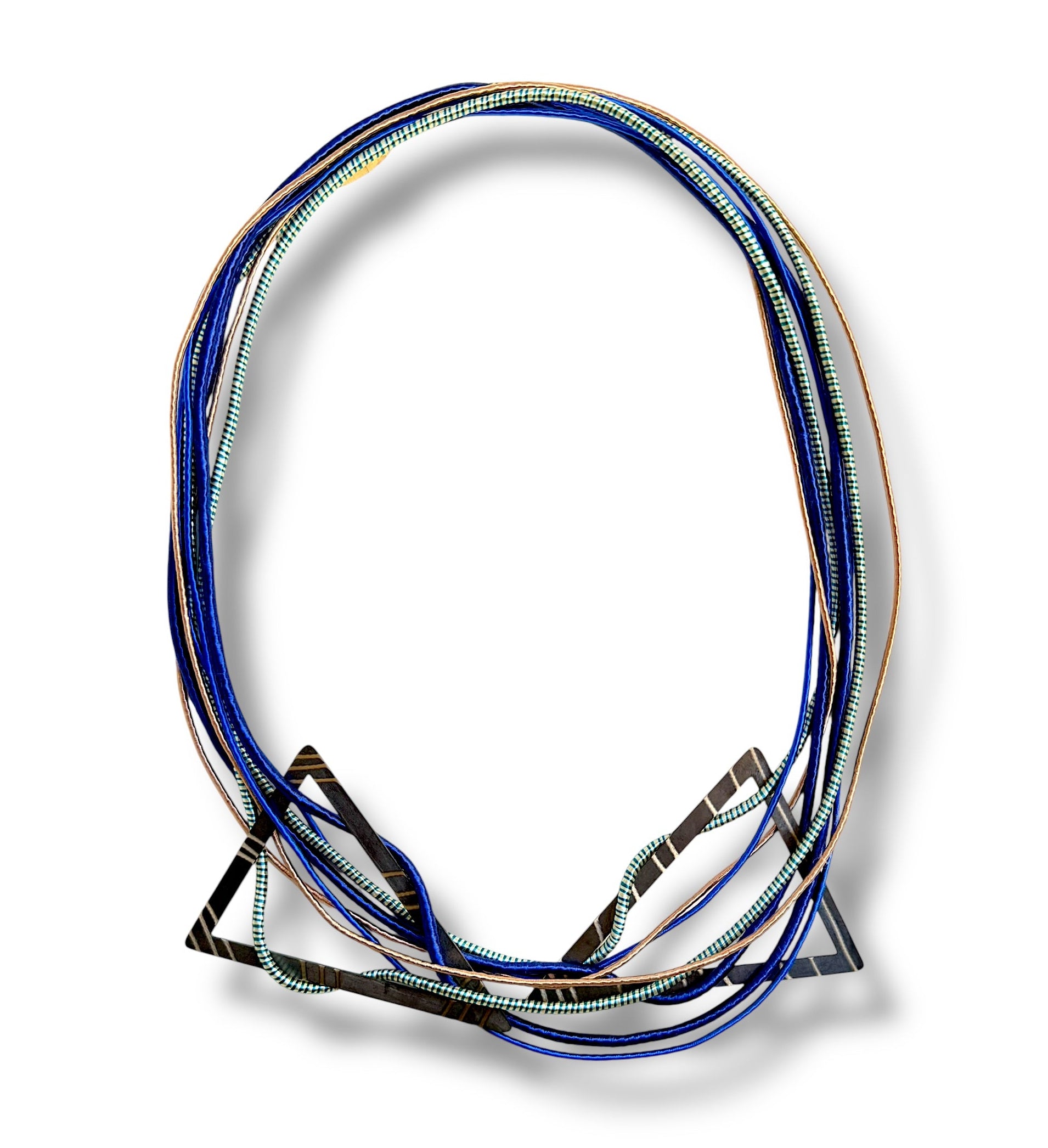 Necklace with blue cotton cords on a white background