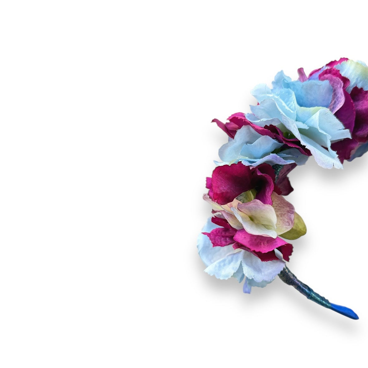 Floral headband, handcrafted with high-quality fabric hydrangeas in soft, layered shades of magenta, blue and purple.