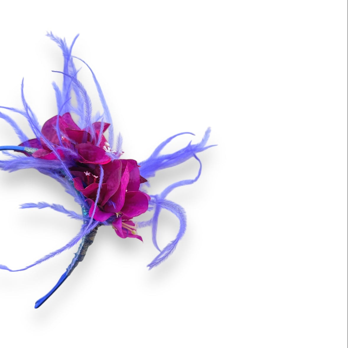 Handcrafted Magenta & Violet Bougainvillea Headband with magenta fabric bougainvillea flowers, wispy violet ostrich feathers and a slim blue headband.