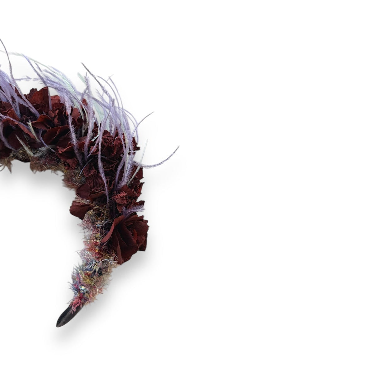 Handcrafted Wild Bloom Lavender Headpiece with deep burgundy-brown preserved hydrangeas, soft lilac and lavender ostrich feathers and textured yarn detailing on a dark velvet padded headband.
