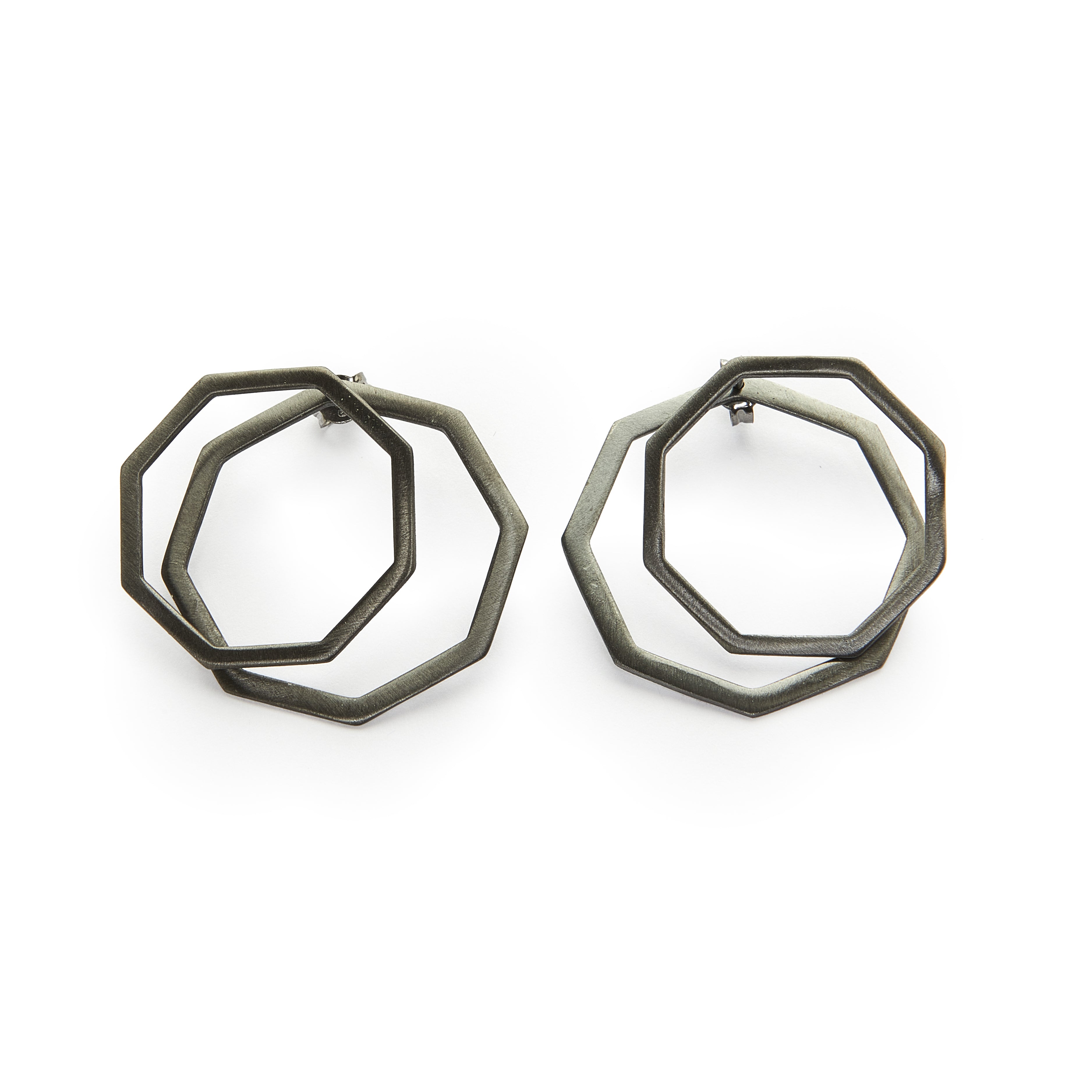 Polygon ear jacket earrings in silver 925 or brass, gold-plated or platinum-plated that can be worn in more than one configuration. Wear these two dimensional front and back earrings in the front of the ear for a classy statement, wear just the front geometric stud earrings for a minimal look or add the back earrings for a special and unique look