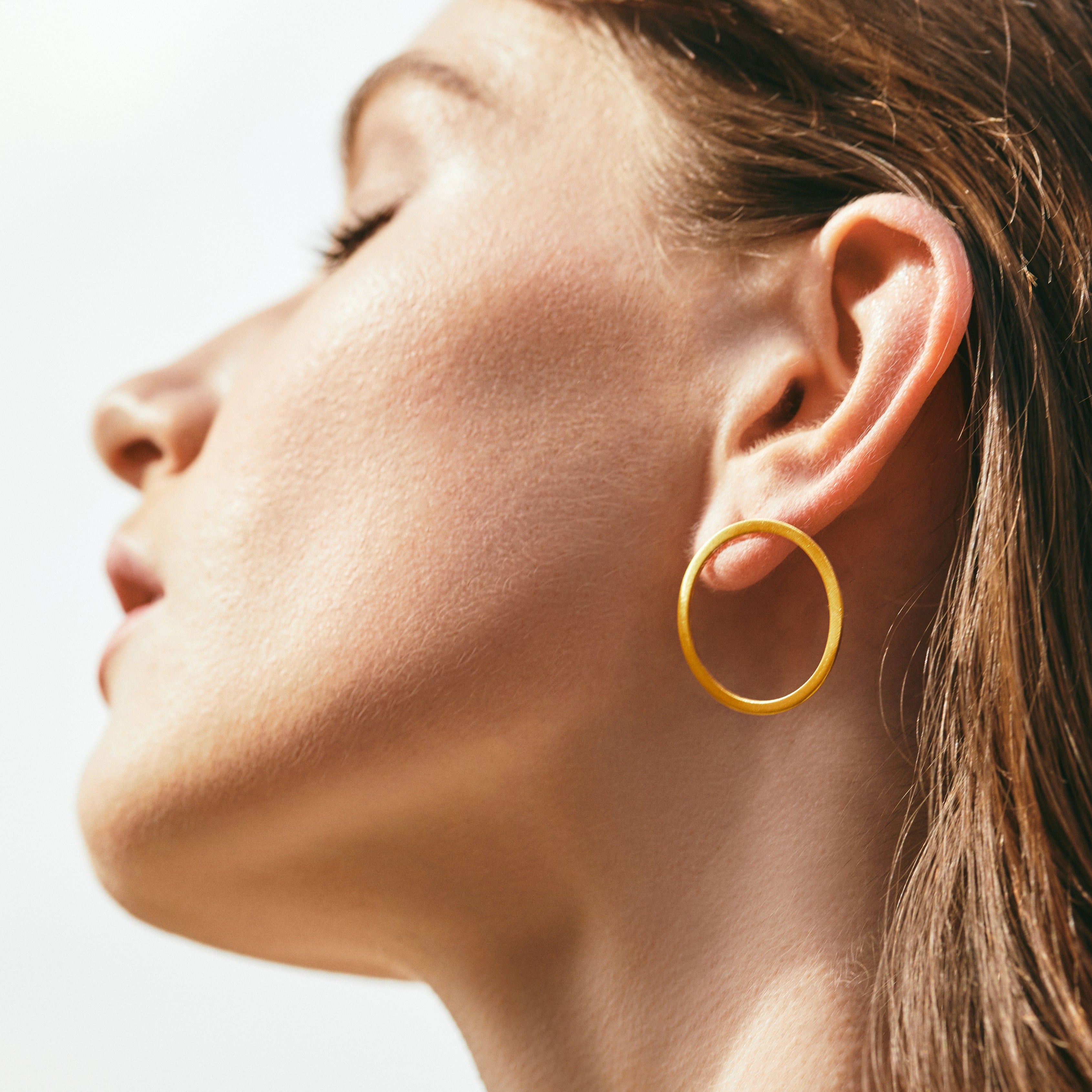 Circle ear jacket earrings