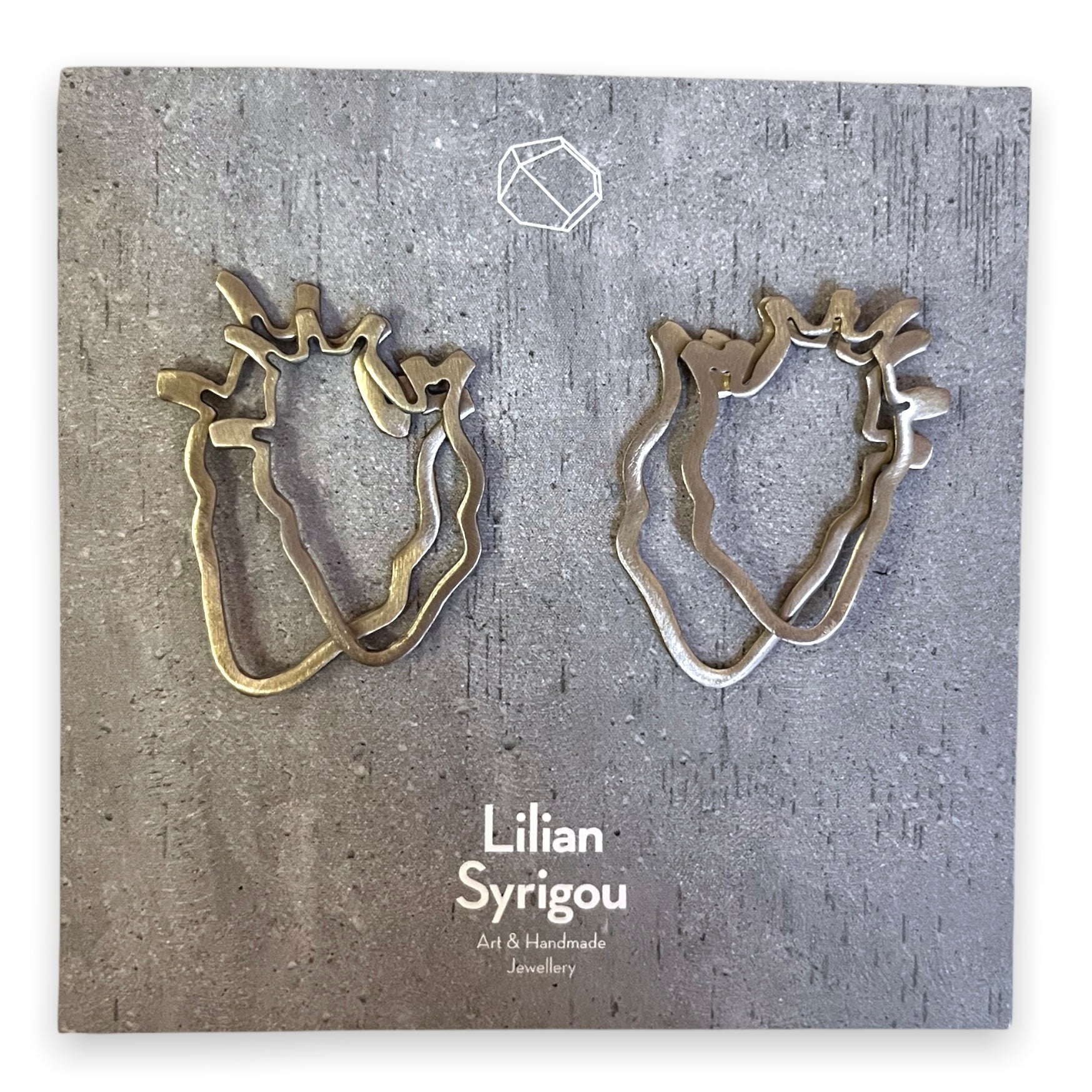 Anatomical Heart ear jacket earrings