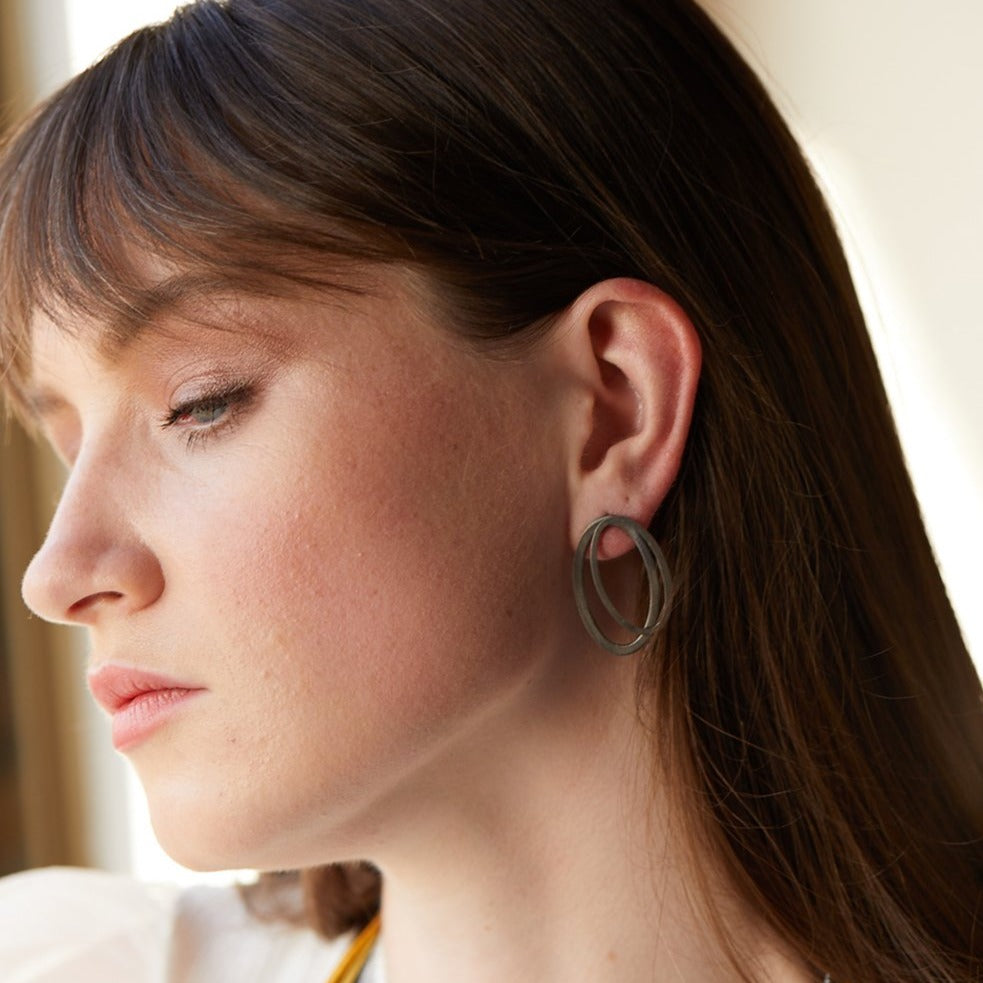 Oval ear jacket earrings