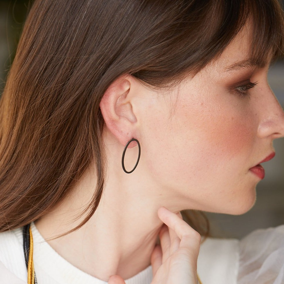 Oval ear jacket earrings