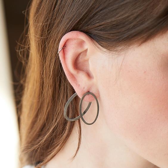 Oval ear jacket earrings